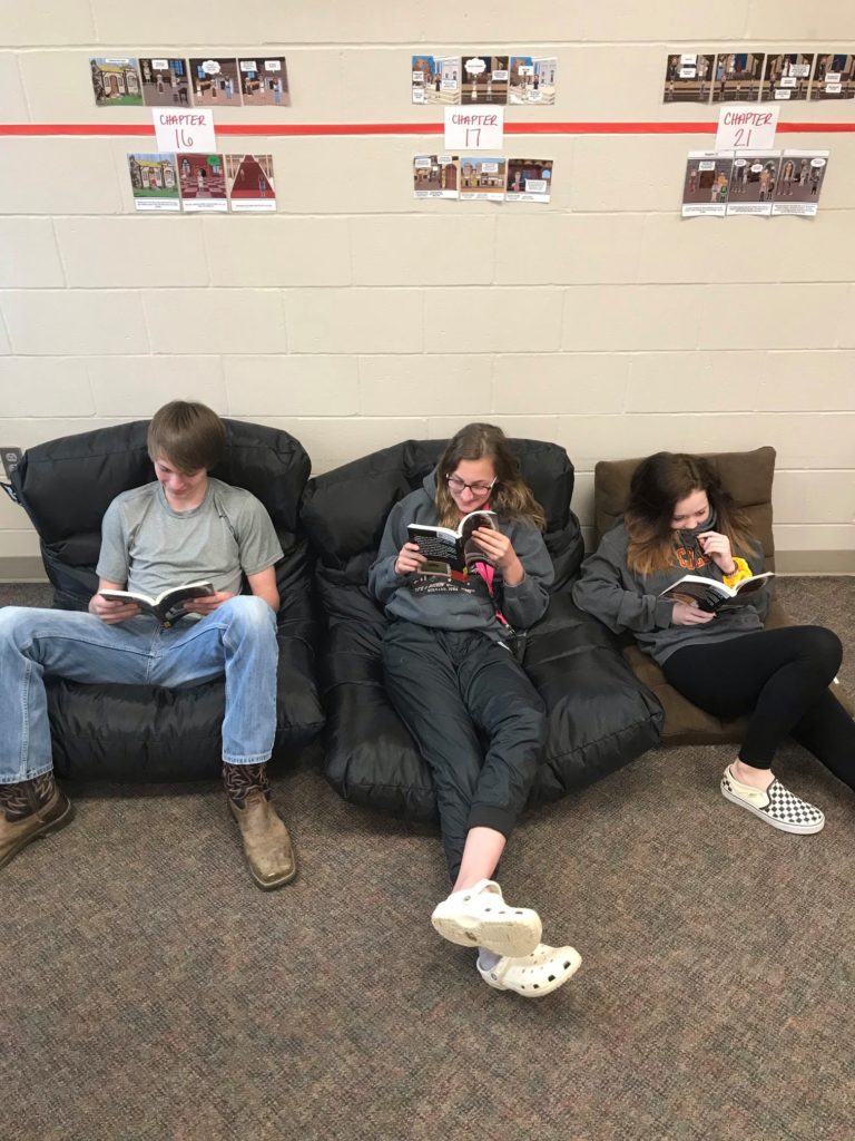 students reading in comfortable seating